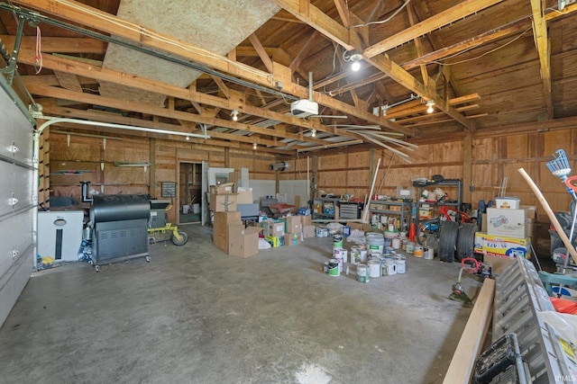 2890 W 400 N, Columbia City, IN 46725 - garage with a garage door opener and a workshop area