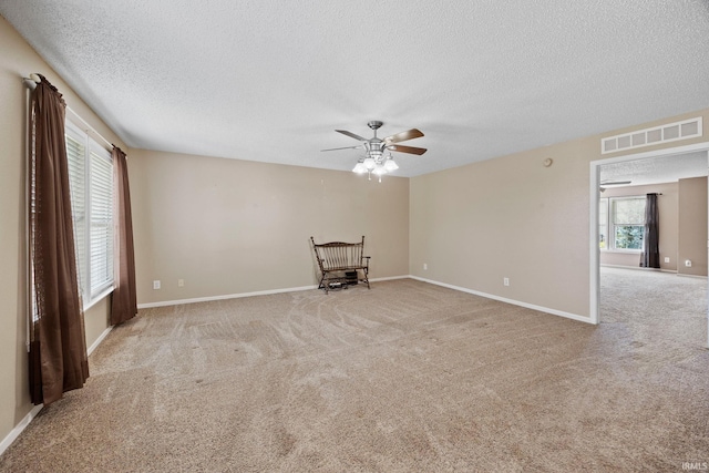 2729 Massasoit Ln, Lafayette, IN 47909 - empty room featuring a textured ceiling, light colored carpet, and a ceiling fan