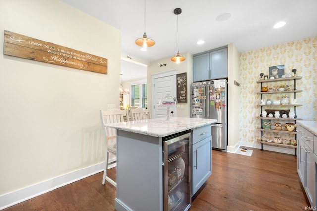 1214 W Jefferson Blvd, Fort Wayne, IN 46802 - kitchen with freestanding refrigerator, beverage cooler, wallpapered walls, dark wood-type flooring, and a breakfast bar