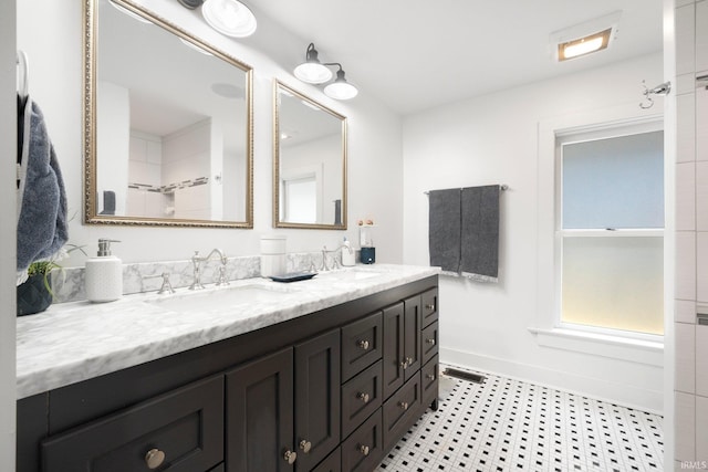 1214 W Jefferson Blvd, Fort Wayne, IN 46802 - bathroom featuring double vanity and a shower