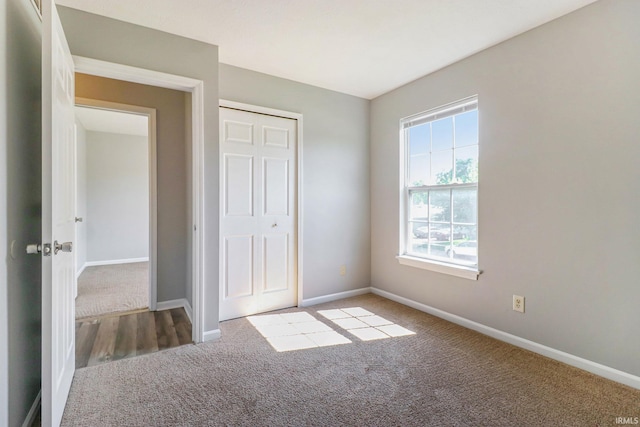 1817 N Elmer St, South Bend, IN 46628 - unfurnished bedroom with carpet flooring and a closet
