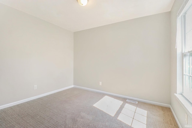 1817 N Elmer St, South Bend, IN 46628 - unfurnished room with light carpet and baseboards