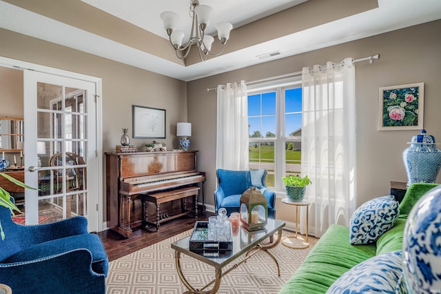 319 Pistoia Cv, Fort Wayne, IN 46845 - living area with a chandelier and wood finished floors