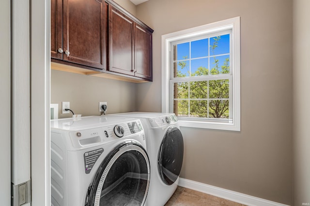 319 Pistoia Cv, Fort Wayne, IN 46845 - laundry area featuring cabinet space and washer and clothes dryer