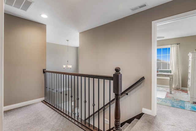 319 Pistoia Cv, Fort Wayne, IN 46845 - staircase with carpet flooring, a chandelier, and recessed lighting
