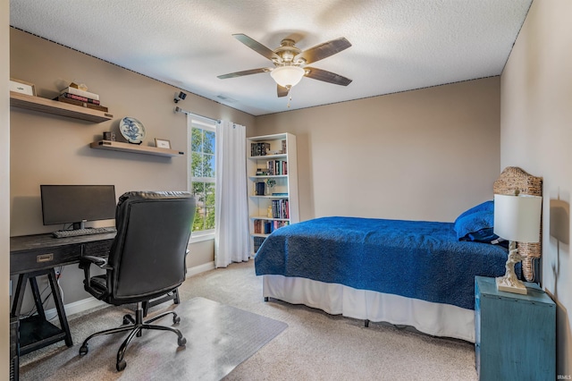 319 Pistoia Cv, Fort Wayne, IN 46845 - carpeted bedroom with a textured ceiling, ceiling fan, and a desk