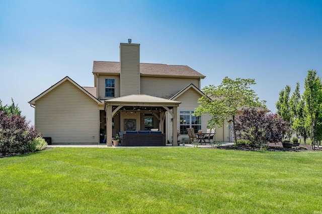 319 Pistoia Cv, Fort Wayne, IN 46845 - view of front of house with an outdoor living space, a gazebo, a front lawn, a chimney, and a patio area