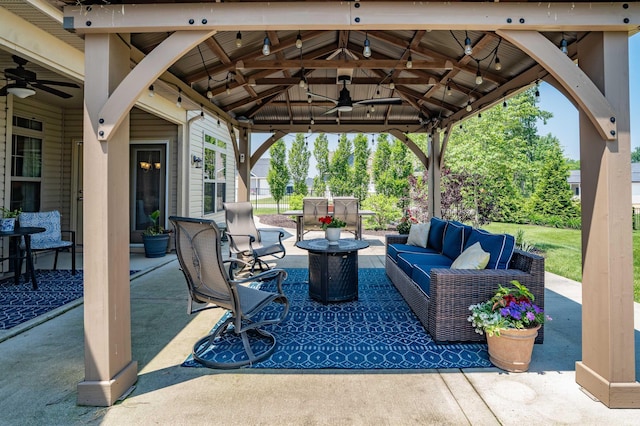 319 Pistoia Cv, Fort Wayne, IN 46845 - view of patio featuring a gazebo, a ceiling fan, and outdoor lounge area