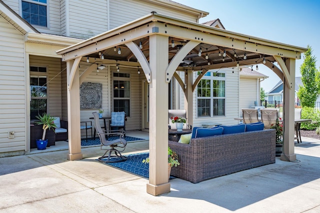 319 Pistoia Cv, Fort Wayne, IN 46845 - view of patio featuring outdoor lounge area, a gazebo, and ceiling fan