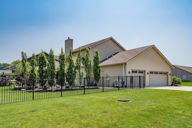 319 Pistoia Cv, Fort Wayne, IN 46845 - view of front facade featuring an attached garage, concrete driveway, and a chimney