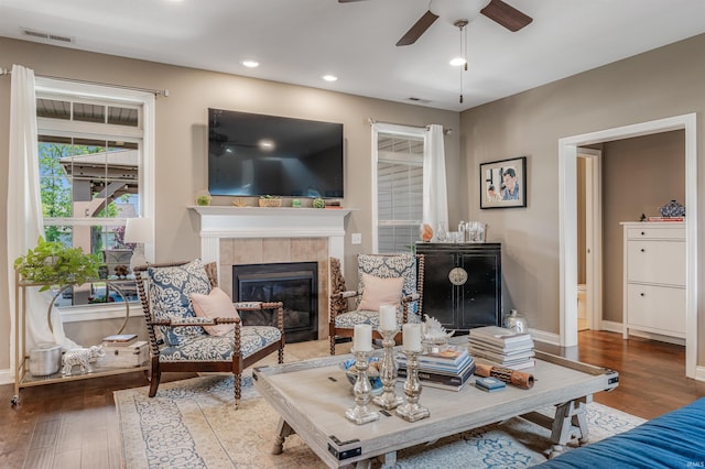 319 Pistoia Cv, Fort Wayne, IN 46845 - living room featuring ceiling fan, hardwood / wood-style flooring, a tile fireplace, and recessed lighting