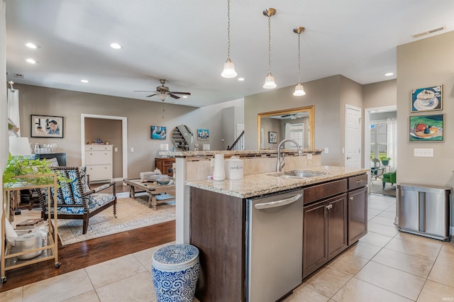 319 Pistoia Cv, Fort Wayne, IN 46845 - kitchen with dishwasher, light tile patterned flooring, ceiling fan, recessed lighting, and decorative light fixtures