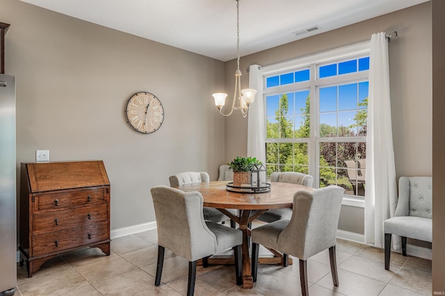 319 Pistoia Cv, Fort Wayne, IN 46845 - dining room featuring a chandelier and light tile patterned floors