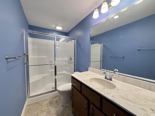 9820 Arbor Lake Dr, Newburgh, IN 47630 - bathroom with tile patterned floors, a stall shower, and vanity