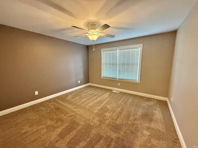 9820 Arbor Lake Dr, Newburgh, IN 47630 - spare room featuring carpet and ceiling fan