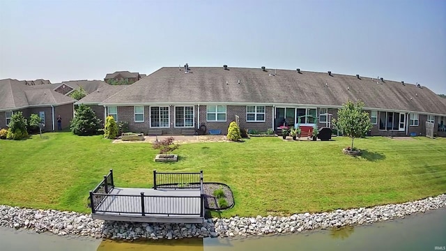 9820 Arbor Lake Dr, Newburgh, IN 47630 - back of property with a yard, a water view, and a patio area