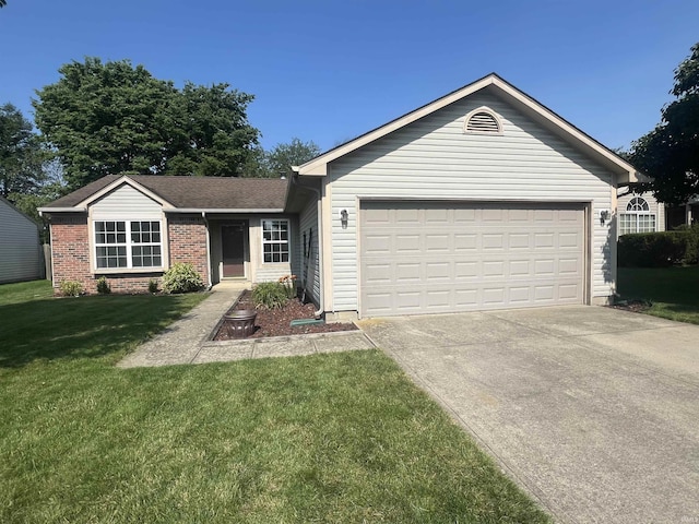 2645 Wynterpointe Ct, Kokomo, IN 46901 - single story home featuring concrete driveway, an attached garage, a front yard, and brick siding