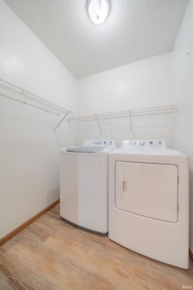 2645 Wynterpointe Ct, Kokomo, IN 46901 - washroom featuring washing machine and dryer and light wood finished floors