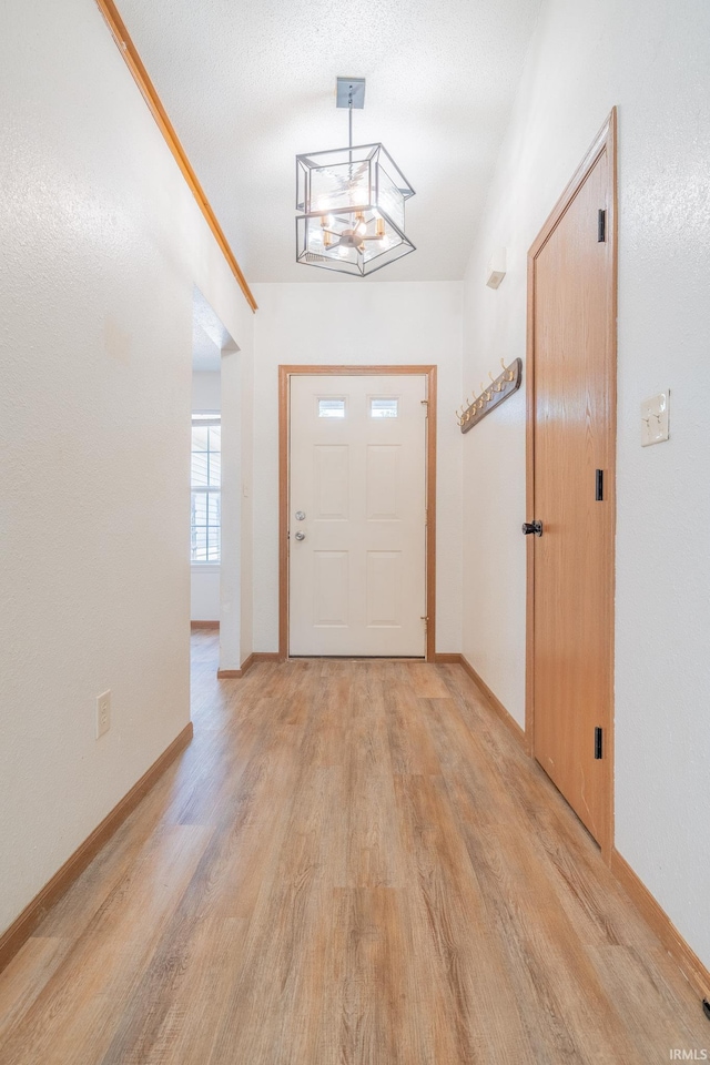 2645 Wynterpointe Ct, Kokomo, IN 46901 - entrance foyer with light wood-type flooring and baseboards