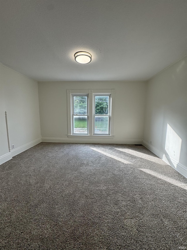 241 W Tipton St, Huntington, IN 46750 - spare room with carpet flooring and baseboards