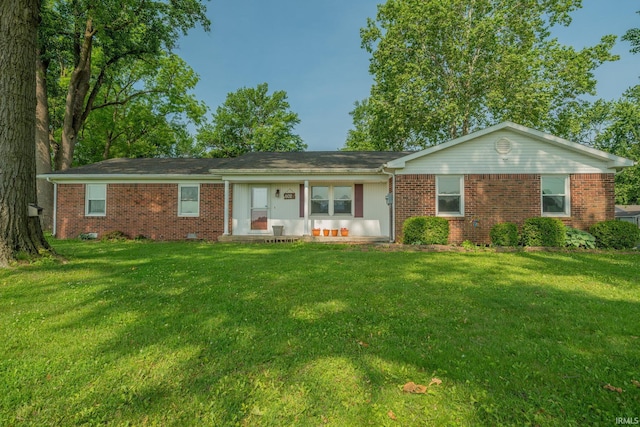 602 S Maple St, Galveston, IN 46932 - ranch-style house with brick siding and a front yard
