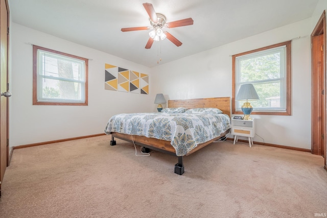 602 S Maple St, Galveston, IN 46932 - bedroom with carpet and ceiling fan
