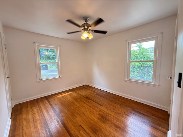 16 S Taft Ave, Evansville, IN 47714 - unfurnished room featuring plenty of natural light, wood finished floors, and a ceiling fan