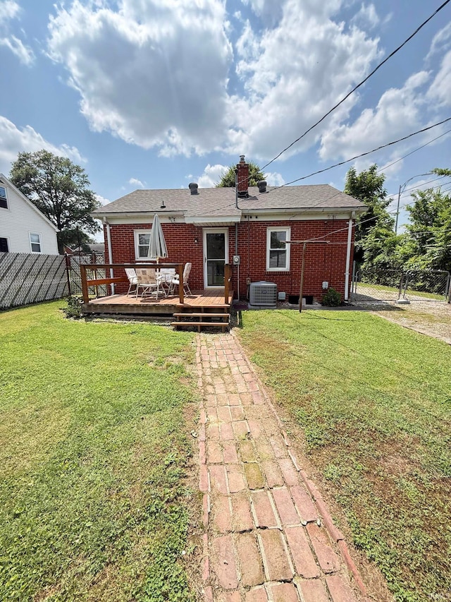 16 S Taft Ave, Evansville, IN 47714 - back of house with brick siding, a deck, and a chimney