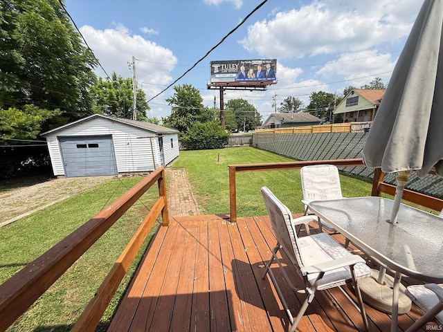 16 S Taft Ave, Evansville, IN 47714 - deck featuring a fenced backyard, an outdoor structure, outdoor dining space, a garage, and driveway