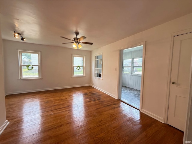 16 S Taft Ave, Evansville, IN 47714 - unfurnished room with plenty of natural light, dark wood-style floors, and a ceiling fan