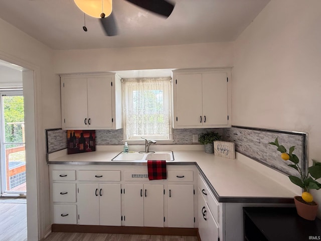 16 S Taft Ave, Evansville, IN 47714 - kitchen with white cabinets, light countertops, healthy amount of natural light, and ceiling fan