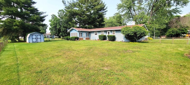113 N Beechwood St, Warsaw, IN 46582 - fenced backyard with a storage shed