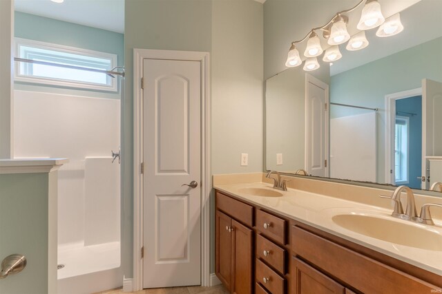 7655 Briar Ct, Newburgh, IN 47630 - bathroom featuring a shower and double vanity