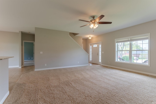 7655 Briar Ct, Newburgh, IN 47630 - unfurnished living room with a ceiling fan and light colored carpet
