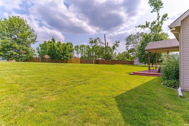 7655 Briar Ct, Newburgh, IN 47630 - view of yard featuring a storage unit and a deck
