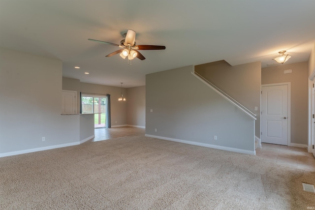 7655 Briar Ct, Newburgh, IN 47630 - unfurnished living room with a ceiling fan, light colored carpet, recessed lighting, and a chandelier