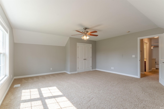 7655 Briar Ct, Newburgh, IN 47630 - unfurnished bedroom featuring carpet floors, lofted ceiling, a closet, and a ceiling fan