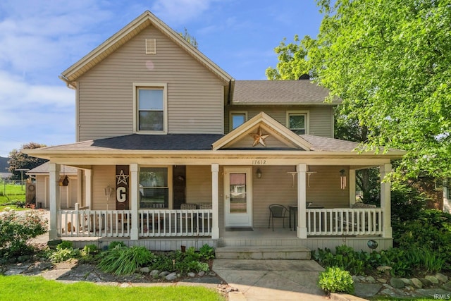 17612 State Road 37, Harlan, IN 46743 - view of front of property featuring a porch and roof with shingles