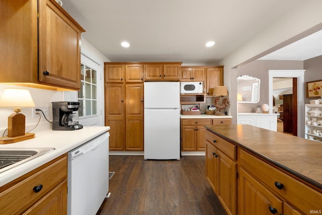 17612 State Road 37, Harlan, IN 46743 - kitchen with white appliances, dark wood finished floors, brown cabinets, and recessed lighting