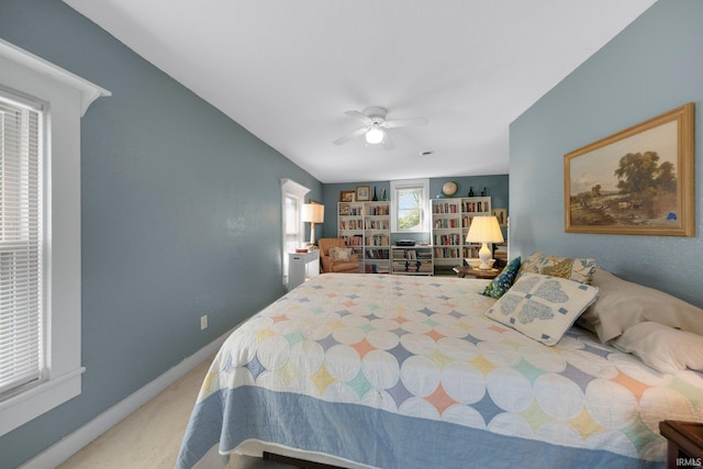 17612 State Road 37, Harlan, IN 46743 - carpeted bedroom with a ceiling fan and baseboards