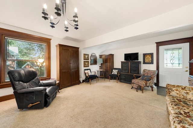 17612 State Road 37, Harlan, IN 46743 - living area with a chandelier and light carpet
