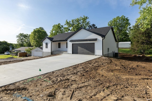 1724 28th St, Bedford, IN 47421 - modern farmhouse with a garage and driveway