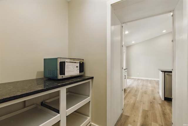 1724 28th St, Bedford, IN 47421 - hallway featuring light wood-style flooring and recessed lighting