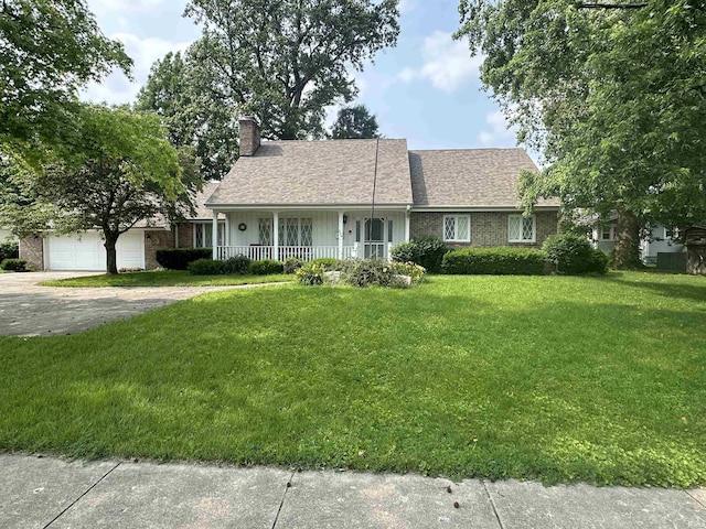 220 W S St, Tipton, IN 46072 - ranch-style home featuring a porch, a chimney, a front lawn, and concrete driveway