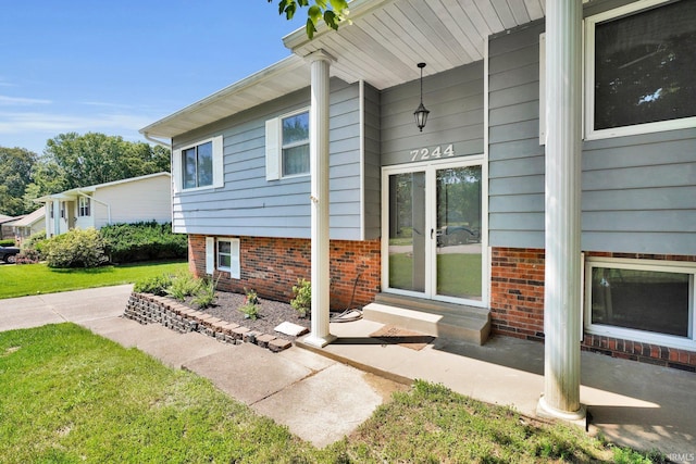 7244 Oaklawn Dr, Newburgh, IN 47630 - entrance to property with brick siding and a yard