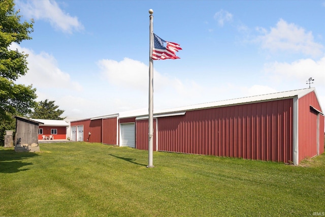 29351 Darden Rd, New Carlisle, IN 46552 - view of green lawn with an outbuilding and a detached garage