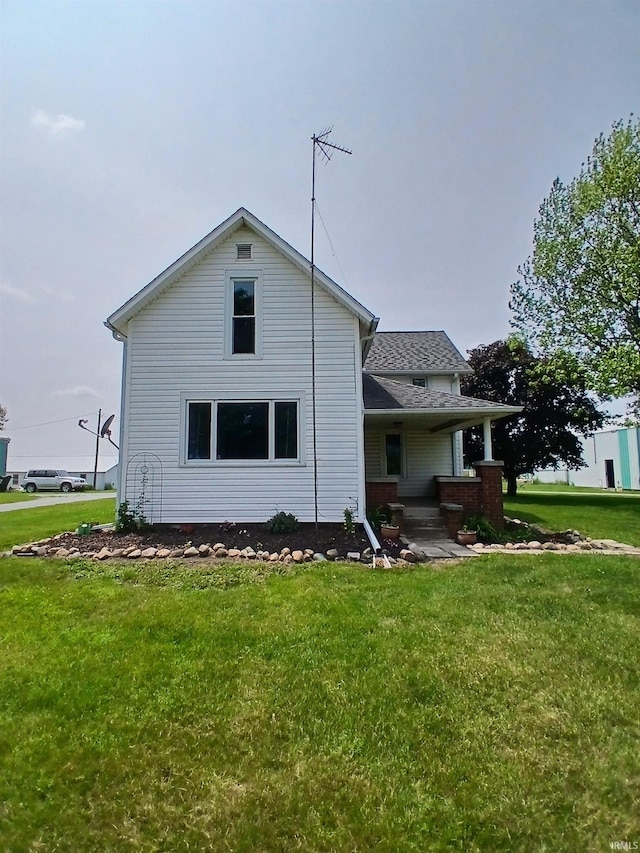 7086 S 200 E, Macy, IN 46951 - back of house featuring a lawn
