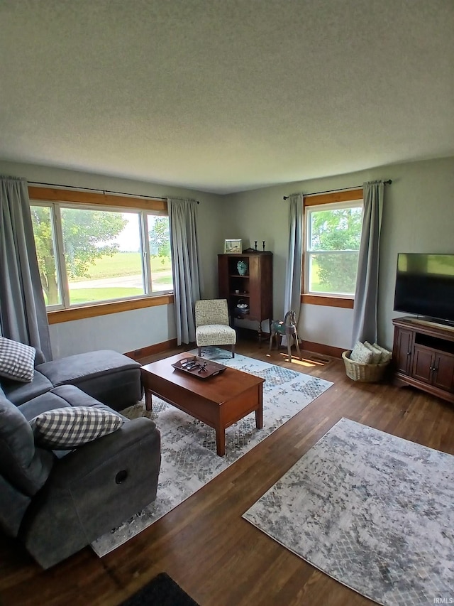 7086 S 200 E, Macy, IN 46951 - living area featuring baseboards and wood finished floors