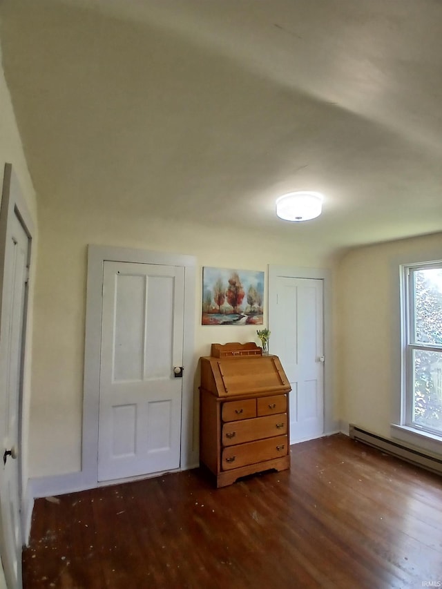 7086 S 200 E, Macy, IN 46951 - bedroom with wood finished floors and baseboard heating
