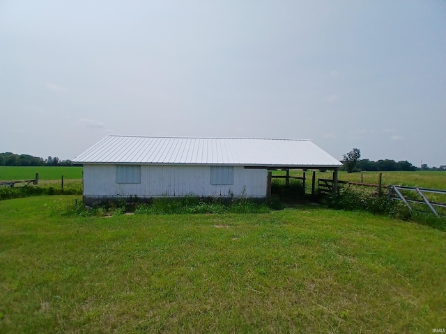 7086 S 200 E, Macy, IN 46951 - view of home's exterior with an outdoor structure, an outbuilding, a view of rural / pastoral area, and a metal roof
